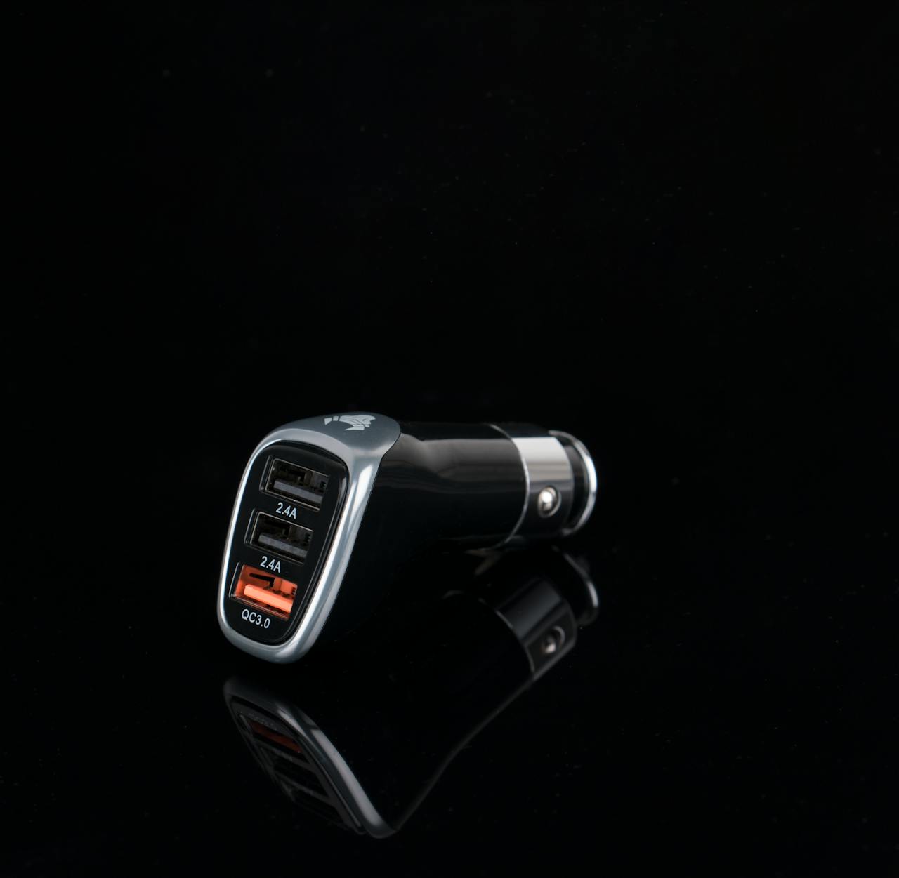 Mastering the First Impression: Your intriguing post title goes here Sleek black car charger featuring multiple USB ports for versatile device charging.